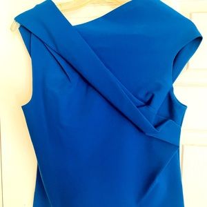 Balenciaga, brand new with tags asymmetrical top, sapphire blue. Size 38, US4